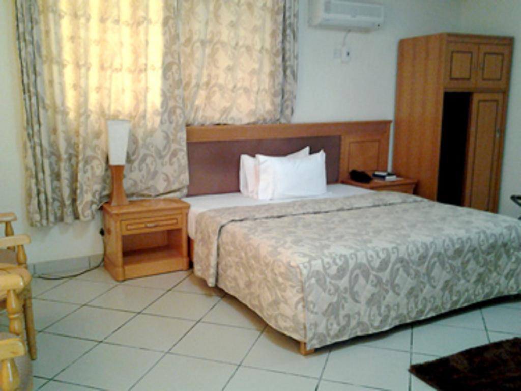 Sunset Hotel Kumasi Quarto foto